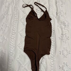 Brown bodysuit